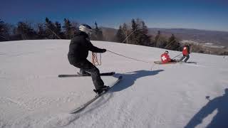 Snow Pro Tips Running a Loaded Toboggan with a Tail Rope [upl. by Solram]